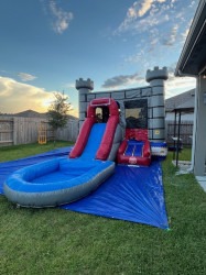 image0 1771176094 Gray Castle Bounce House w/ Slide